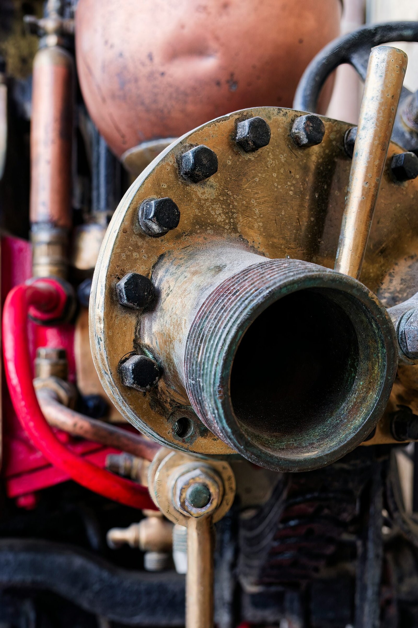 A close up of a machine with pipes and valves